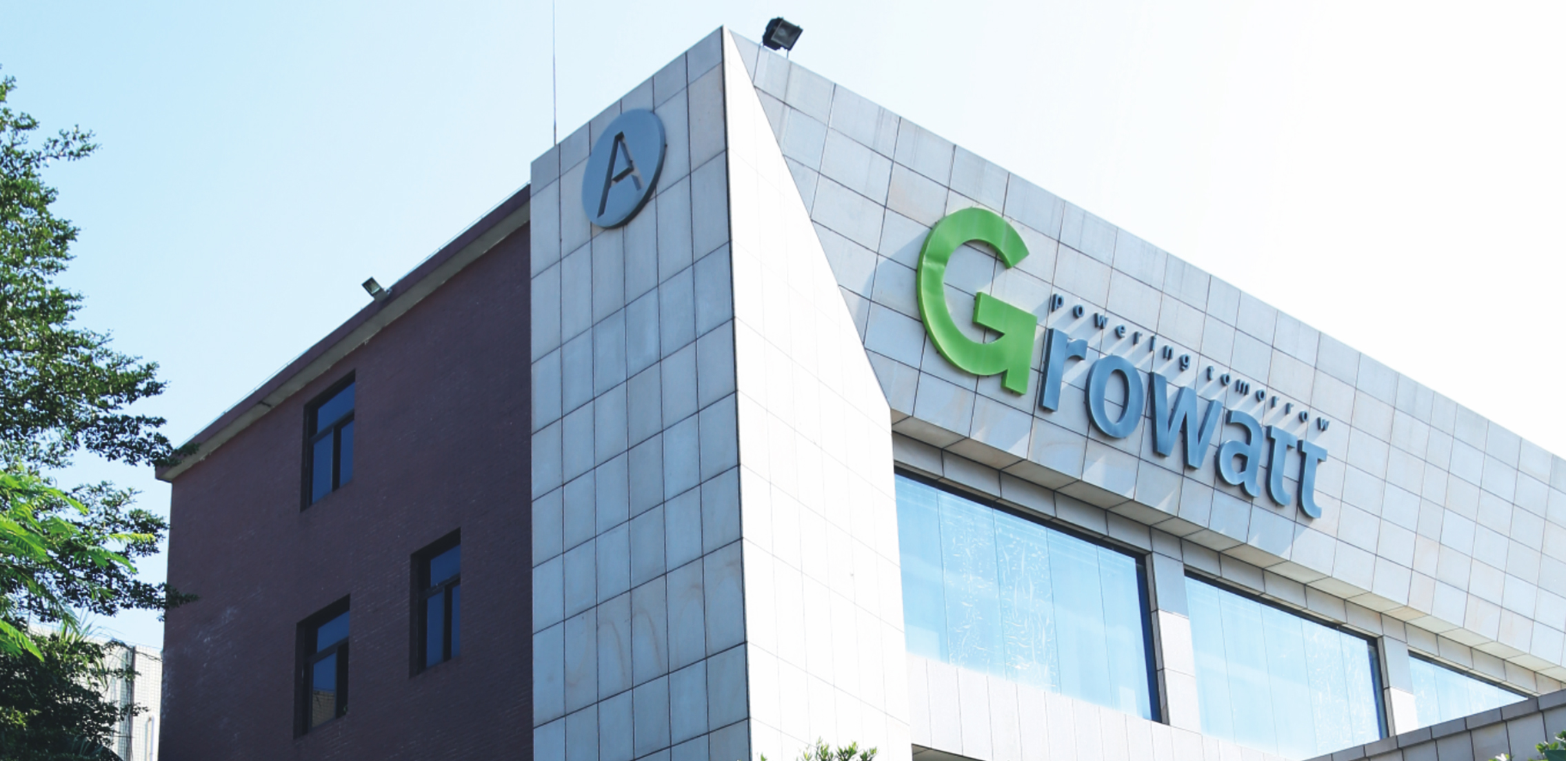 First Growatt office, Growatt founding office, 2011 GrowattA modern building with a 'Growatt' company logo on its facade under a clear sky.